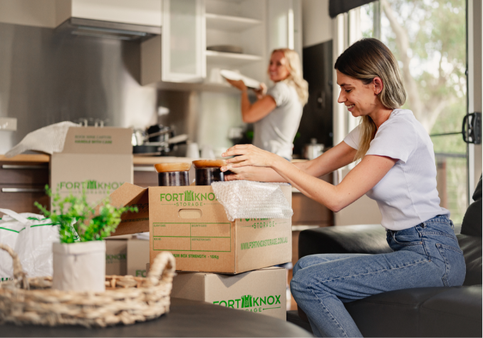 person unpacking box
