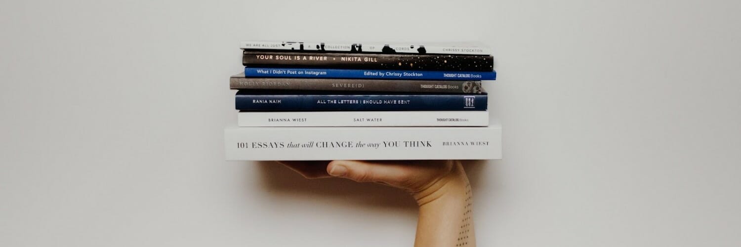 person holding books